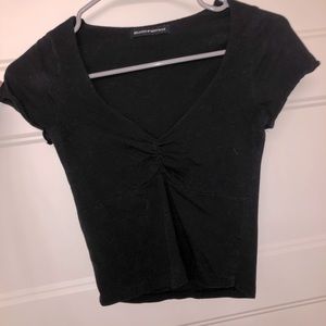 Super cute black top.